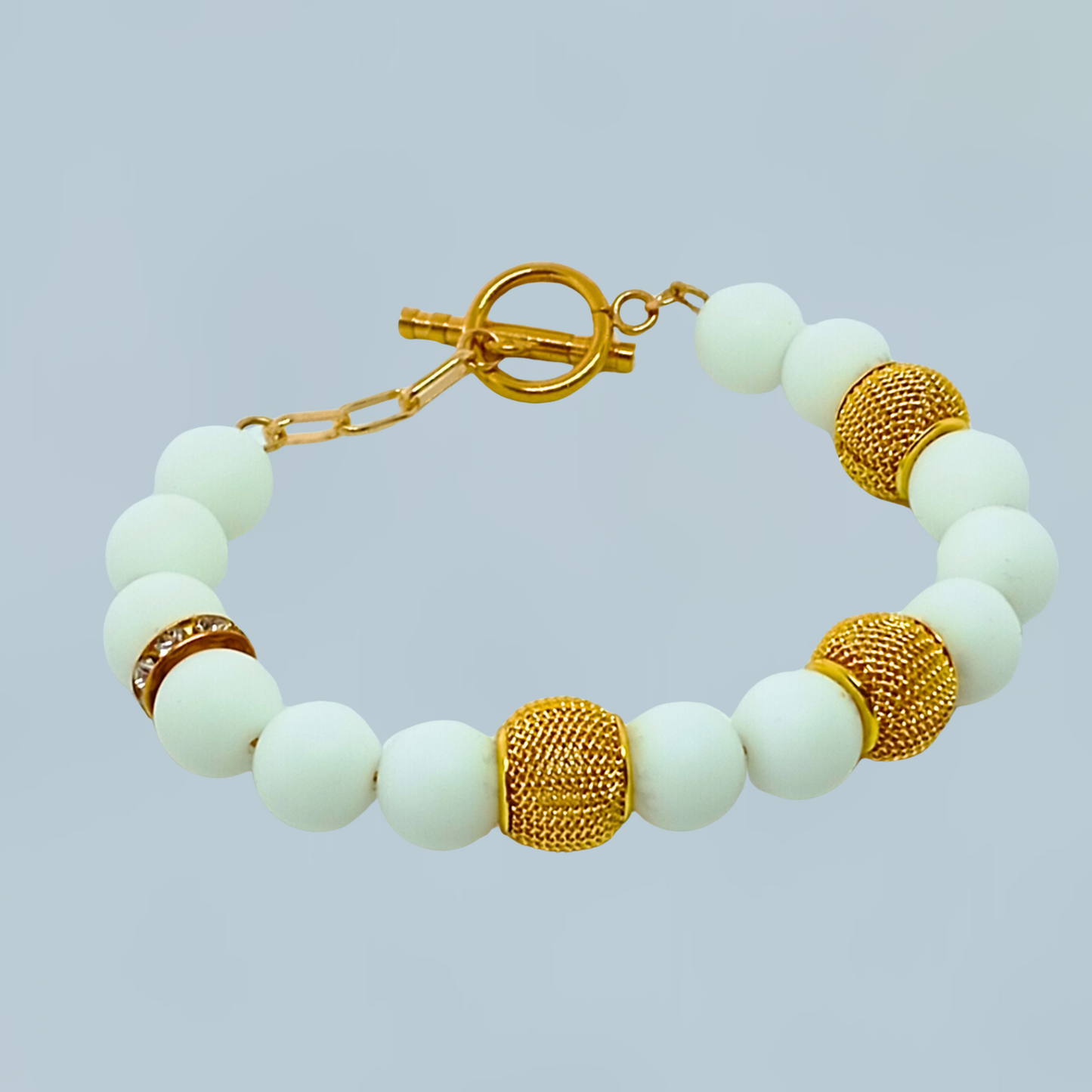 ARMBÅND GREECE. Guld, sølv, naturlig onyx sten, rustfrit stål. Kvinde. Håndlevet